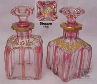 Бутылочки розового стекла с росписью